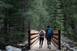 © Michael - Two young women hiking in a forest