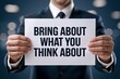 © Prazis Images - Businessman holding a bring about what you think about sign.