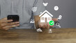 © denis - Man analyzing real estate investment on smartphone, managing property mortgage, financial planning, house loan approval, market search, asset valuation, and investment strategy for profit growth
