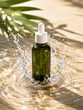 © Krittaya_CH - Premium green glass dropper bottle mockup on beige sand with fresh water splashes