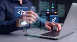 © Studio KN - AI powered low code development platform concept with professional using laptop and stylus on digital interface for automated software creation cloud computing and intelligent workflow optimization