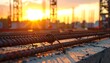 © TAHAN - A construction site at sunset with rebar on a concrete foundation