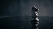 © Blood Group - Black knight chess piece on dark reflective surface, strategic business concept with horse chessman, cinematic low key lighting with copy space