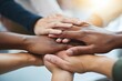 © Studio Nova - The Hands of a Diverse Team Joined Together in Compassionate Support and Unity