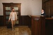 © Serhii - Man entering hotel lobby for check in