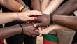 © Oce - Diverse group of people joining hands in unity and collaboration.