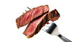 © Fried - Juicy medium-rare steak slices on fork