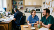 © logonv - Woman doctor and man surgeon in hospital canteen having coffee break. Medical staff resting in clinic break room. Professional healthcare team communication and wellness at workplace.