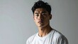 © nur khayati w - Portrait of a Young Asian Man with Intense Gaze.