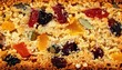 © ZakiJaisYusof - Close-up texture shot of a dense fruitcake's crumb, showcasing dried fruits and nuts.