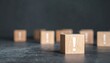 © Waqas - Exclamation Mark Wooden Cubes on Dark Surface
