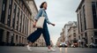 © SashaMagic - Woman with tote bag walking on city street in the evening, low angle shot with copy space
