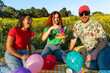 © Alba Vitta Studio/Stocksy - Friends Celebrate Birthday Outdoors