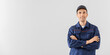 © Pixel-Shot - Male car mechanic on light background