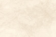© nguyenhuu - Cream beige textured paper background. Blank off white fiber parchment surface for elegant minimal graphic layout design mockup.