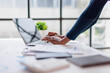 © David - Professional hands interacting with laptop keyboard, analyzing business data and financial documents on office desk, working on productivity and technology solutions
