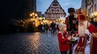 © Amnah - Little girl receiving a gift from saint nicholas at a christmas market