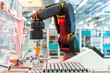 © Westend61 - Arm of assembly robot picking up machine part, Stuttgart, Germany