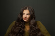 © millaf (Nemchinova) - Happy woman hair. Beautiful model with long curly hairstyle posing