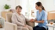 © Iuliia - Nurse holding hands of elderly woman sitting in armchair. Senior care support and compassion in nursing home. Medical professional providing help to patient. Healthcare assistance concept.