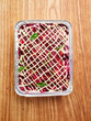 © Food Images - Layered beet salad with mayonnaise and herbs, catering event, festive gathering concept