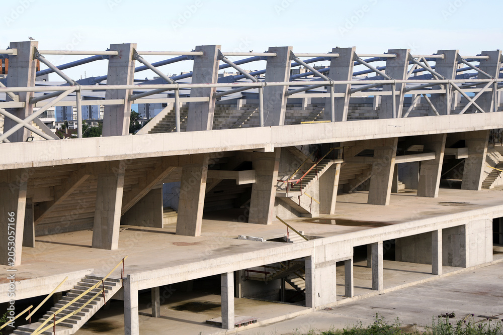 Concrete stadium construction showing brutalist architecture and ...
