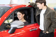 © JackF - Young discussing new car inside dealership showroom, lifestyle and transport concept of auto sales