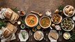 © rodrigotheras - Cozy Winter Meal Spread Featuring Brazilian Flavors and Warm Drinks