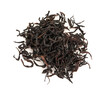 © Pixel-Shot - Heap of dry black tea leaves isolated on white background, closeup