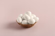 © Pixel-Shot - Wicker bowl with fresh boiled quail eggs on grey background