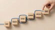 © King Stock - From Baby to Dad: A Stairway of Growth, Effort, Learning, and Success illustrated with wooden blocks and a guiding blue line.