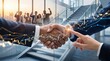 © Sheng - Business handshake deal celebration with stock market graph overlay, team cheering in background