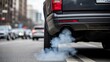 © millennium - Car exhaust emitting smoke on urban road causing air pollution concept