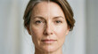 © Goutam - Comparison of a womans face showing aging skin versus rejuvenated skin