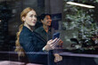 © ReeldealHD images - Businesswoman making financial investments using a smartphone