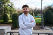 © Oscar - Young man posing confidently in urban park
