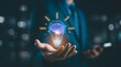 © Muhammad - A businessman holds a glowing lightbulb with a brain inside, representing innovation, creativity, and brilliant ideas in business.