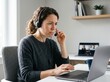 © Aliaksandr Barouski - Remote worker adjusting drooping headset mic during home video call mishap