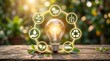© Ctra - Glowing light bulb with eco-friendly icons representing sustainable renewable energy and environmental conservation on a natural green background