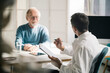 © Westend61 - Doctor talking to senior patient in medical practice