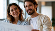© Kateryna - A loving couple remodels softly their house holding a calm blueprint in a bright room in soft daylight blueprint couple open faces bright interior daylight workspace soft