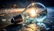 © Sofia - A cracked incandescent lightbulb with glowing filament lies on a textured surface, symbolizing a brilliant but broken idea or concept.