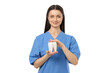 © Atlas - A person in blue clothing holds a large tooth model, isolated, PNG