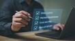 © Riski Digital Studio - Man checks off tasks on holographic to do list
