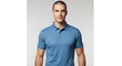 © M.R Ramadhan - Man wearing blue short sleeved polo shirt standing confidently in casual attire for fashion and lifestyle concepts