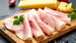 © Hanania Project - Raw fish slices with parsley on a wooden cutting board with cheese