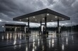 © Sekai - Empty petrol station under heavy grey overcast sky immediately after rainfall surfaces wet glistening reflective