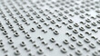 © pattozher - Binary Code Abstraction: A detailed close-up captures the abstract beauty of binary code, with raised zeros and ones forming an intricate digital pattern.