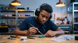 © Azlan Art  - Young African American technician soldering circuit board in modern electronics workshop