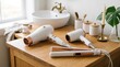 © BusTech - White hairdryer and hair straightener tools rest on wooden vanity. Bathroom interior setting includes sink and decor. Pro beauty appliances for hair styling at home.